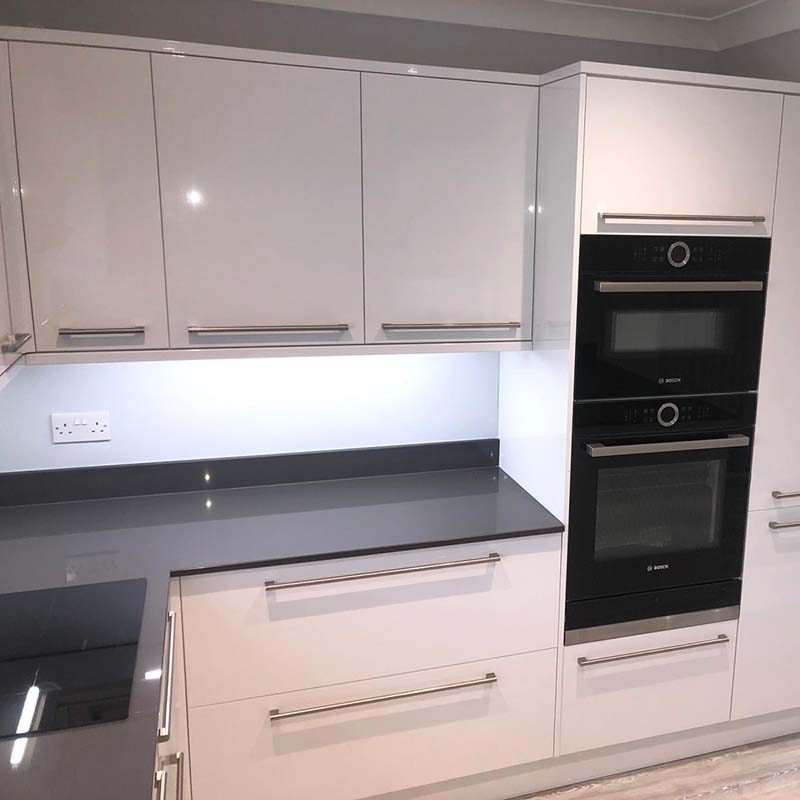 New white and black kitchen install with bright lights